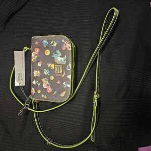 Dooney & Bourke Black Crossbody with Neon Green Accents